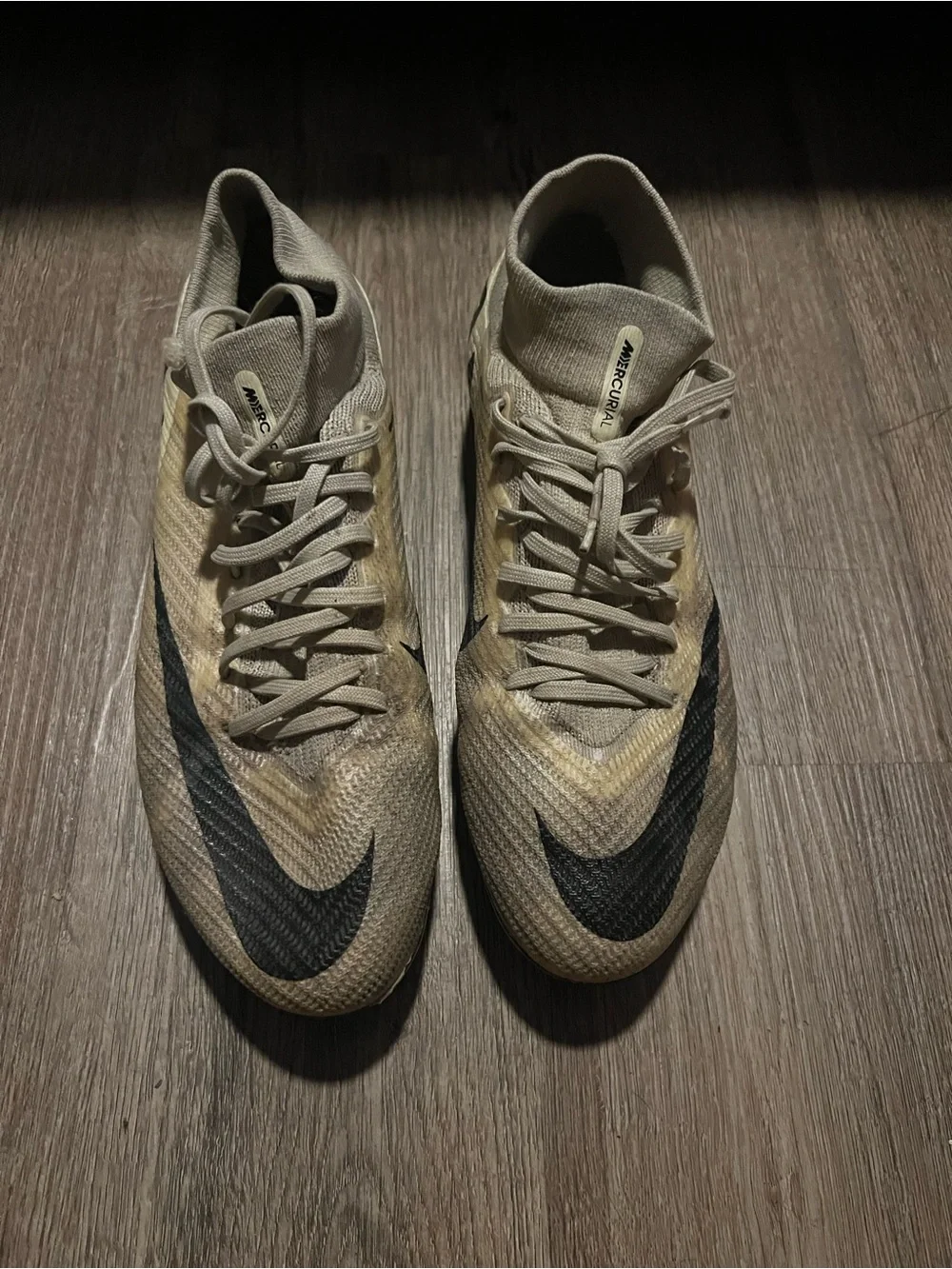 Nike Men’s Soccer Cleats in Beige with Black Swoosh